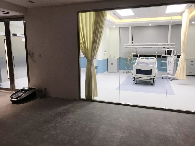 QUEN shoe cover machine installed in a hospital clean room
