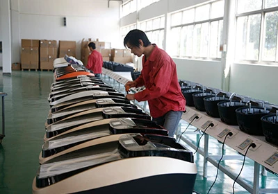 QUEN shoe cover machine factory testing area